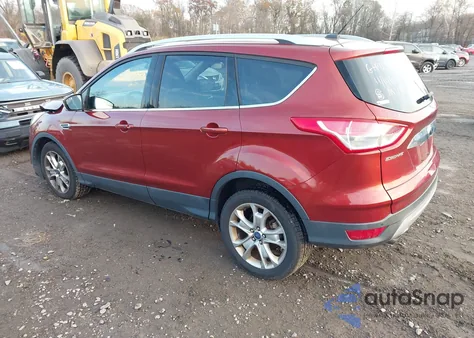 2015 Ford Escape Titanium z USA, uszkodzony, nr VIN 1FMCU9J92FUC72288